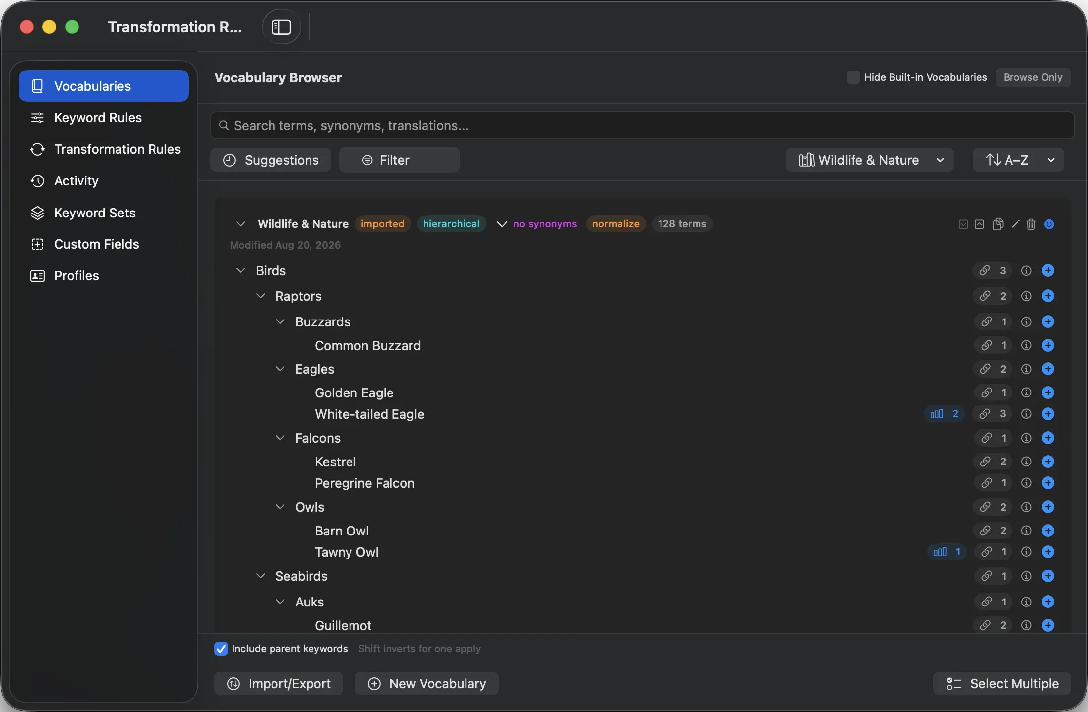 The Vocabulary Browser in dark mode, showing the Wildlife & Nature vocabulary expanded through Birds, Raptors, and Owls, with per-term link counts and a search field across terms, synonyms, and translations.