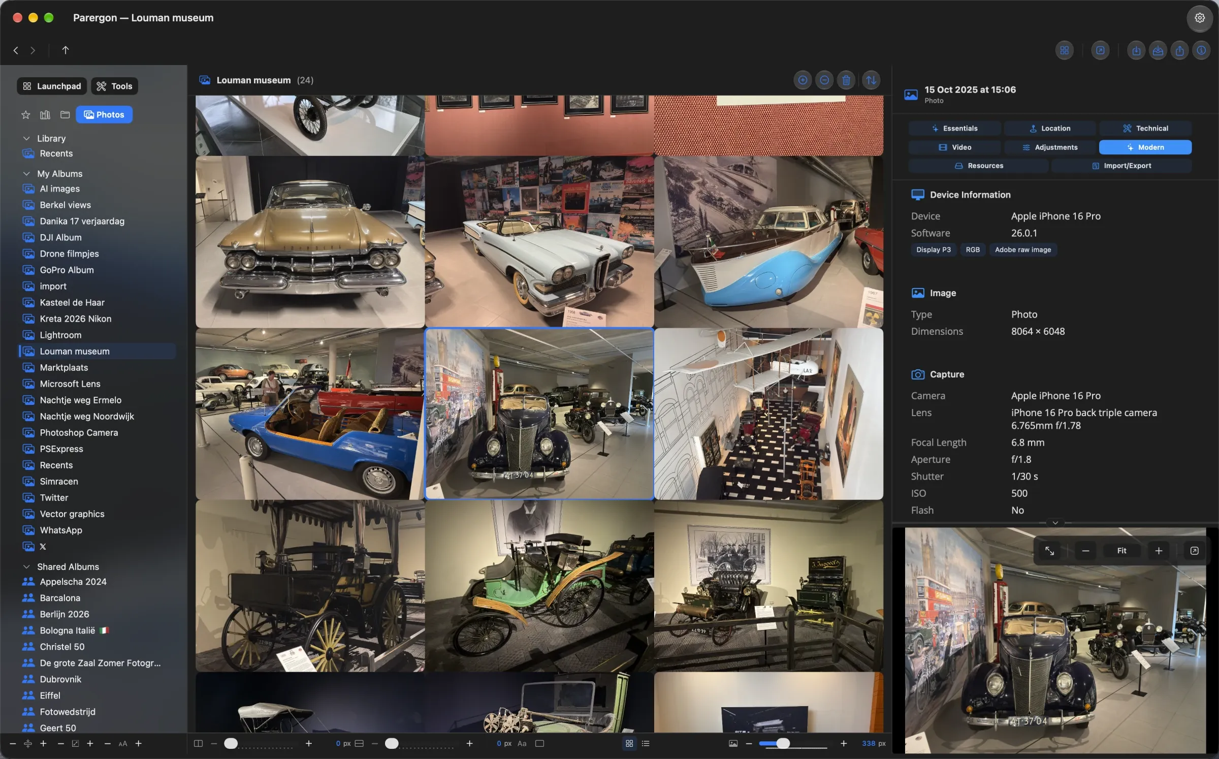 Parergon in dark mode browsing an Apple Photos album of classic cars, with the window title reading Parergon and the photo's device and capture details in the inspector